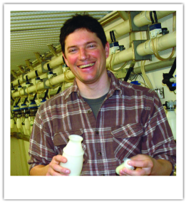 Peter Krawczel milk sampling at Miner Institute in 2010. Peter spent four years at Miner Institute as a graduate student and earned his Ph.D. in animal behavior from the University of Vermont. 